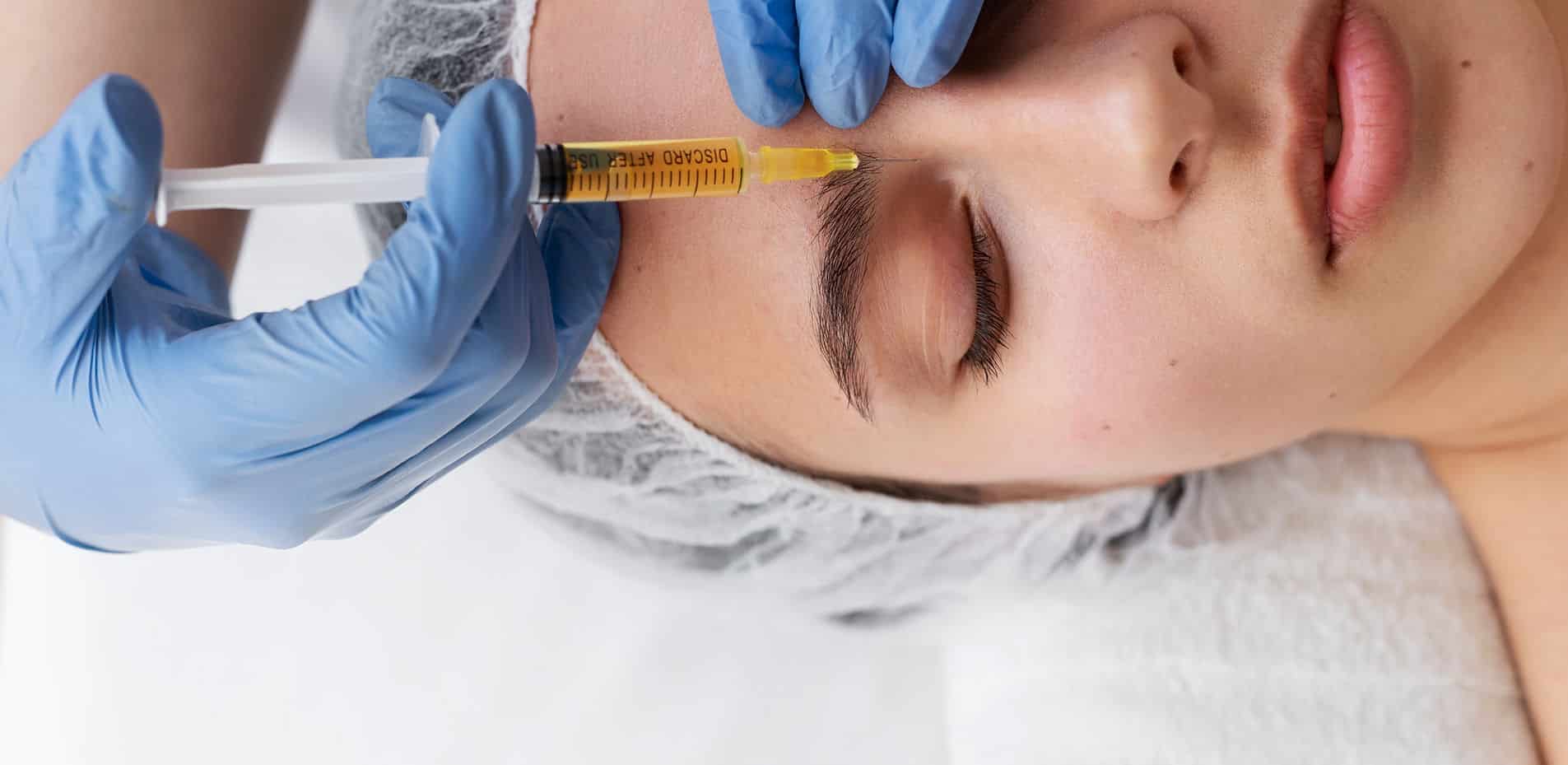 beautiful-young-woman-getting-botox-cosmetic-injection-her-face.jpg